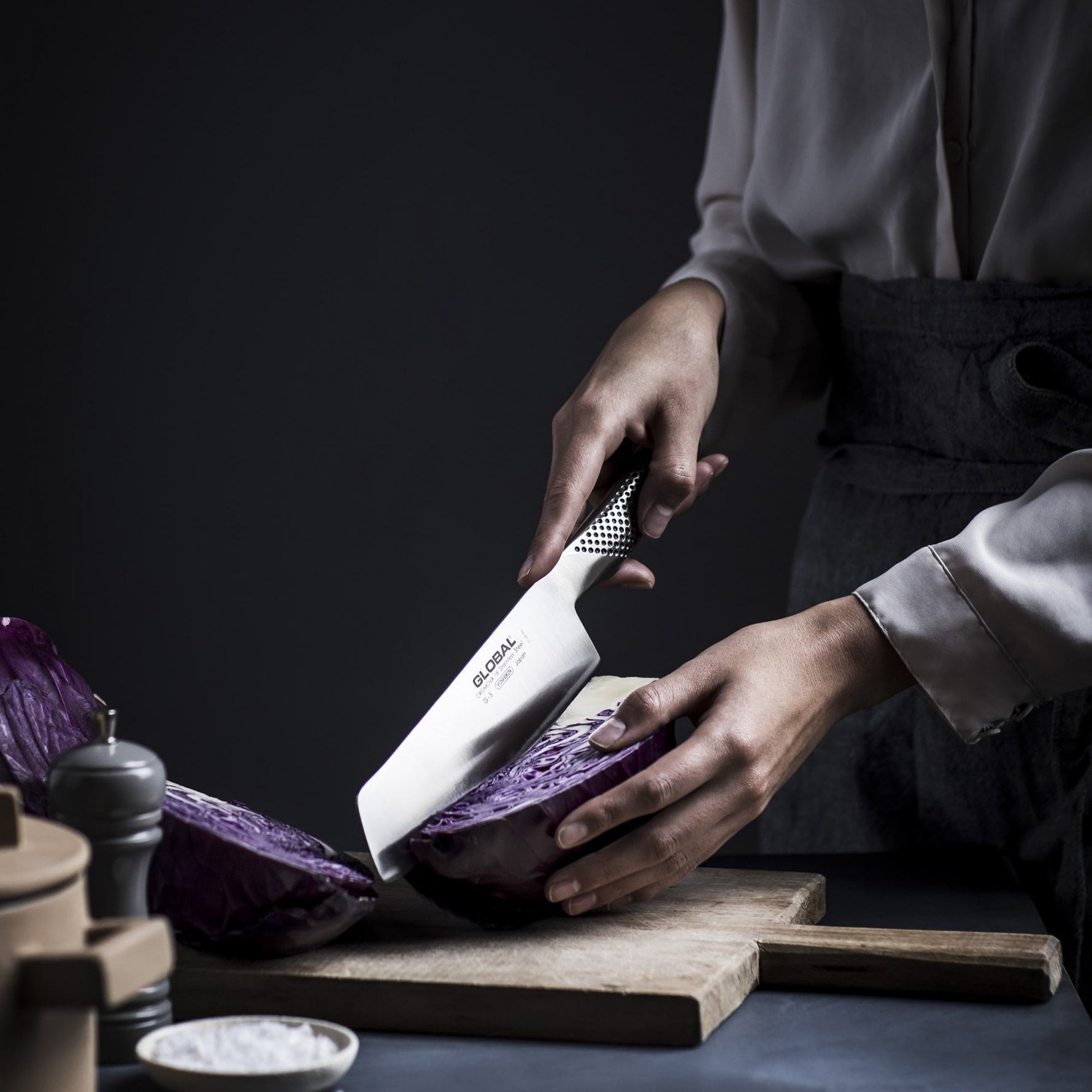 G-5 stainless steel vegetable chopper being used by home cook to chop cabbage. 