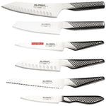 Set of Global Japanese kitchen knives on a white background. Japanese stainless stele knives for home cooks and professional chefs.