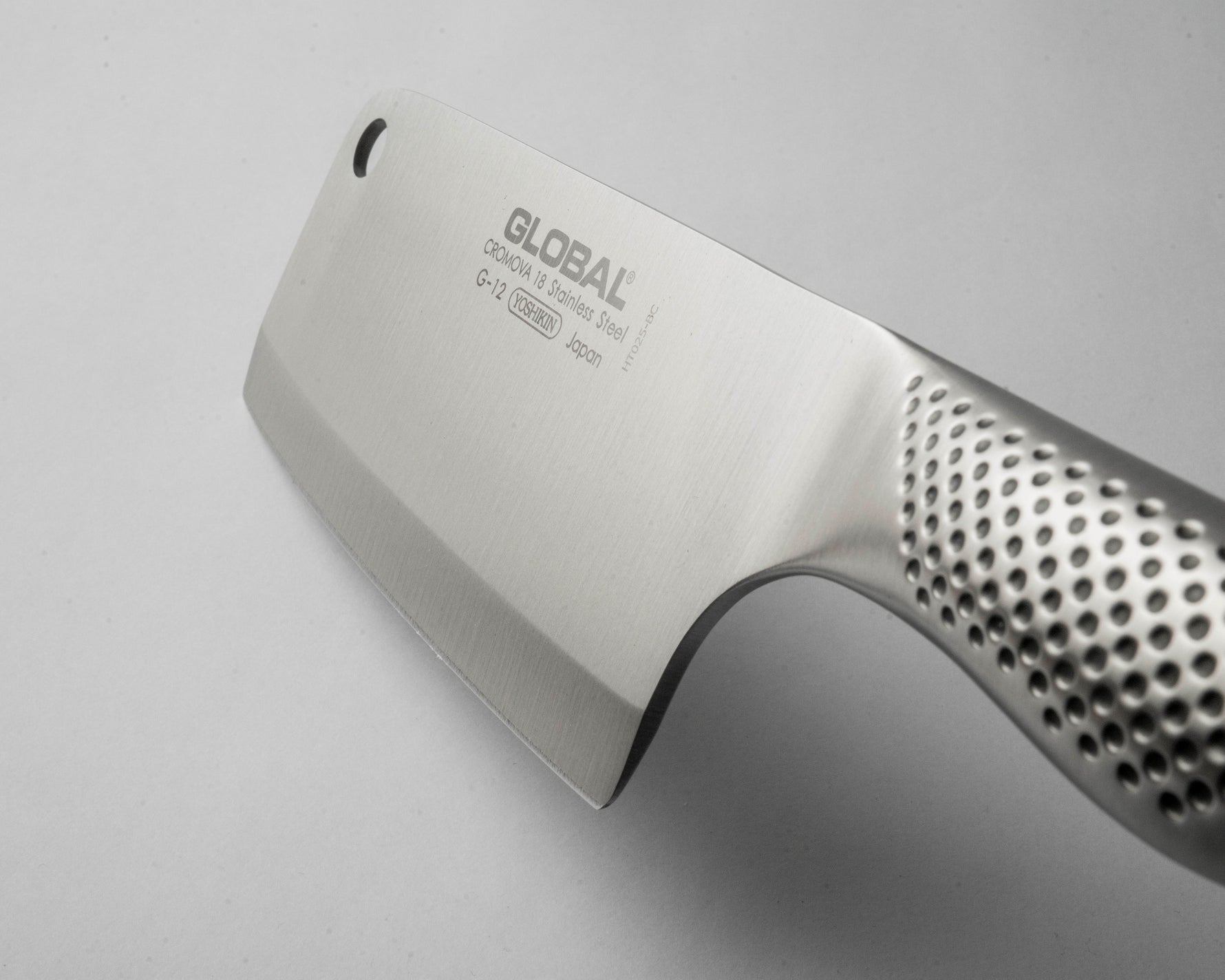 Close up of rectangular G-12 Meat Chopper blade.