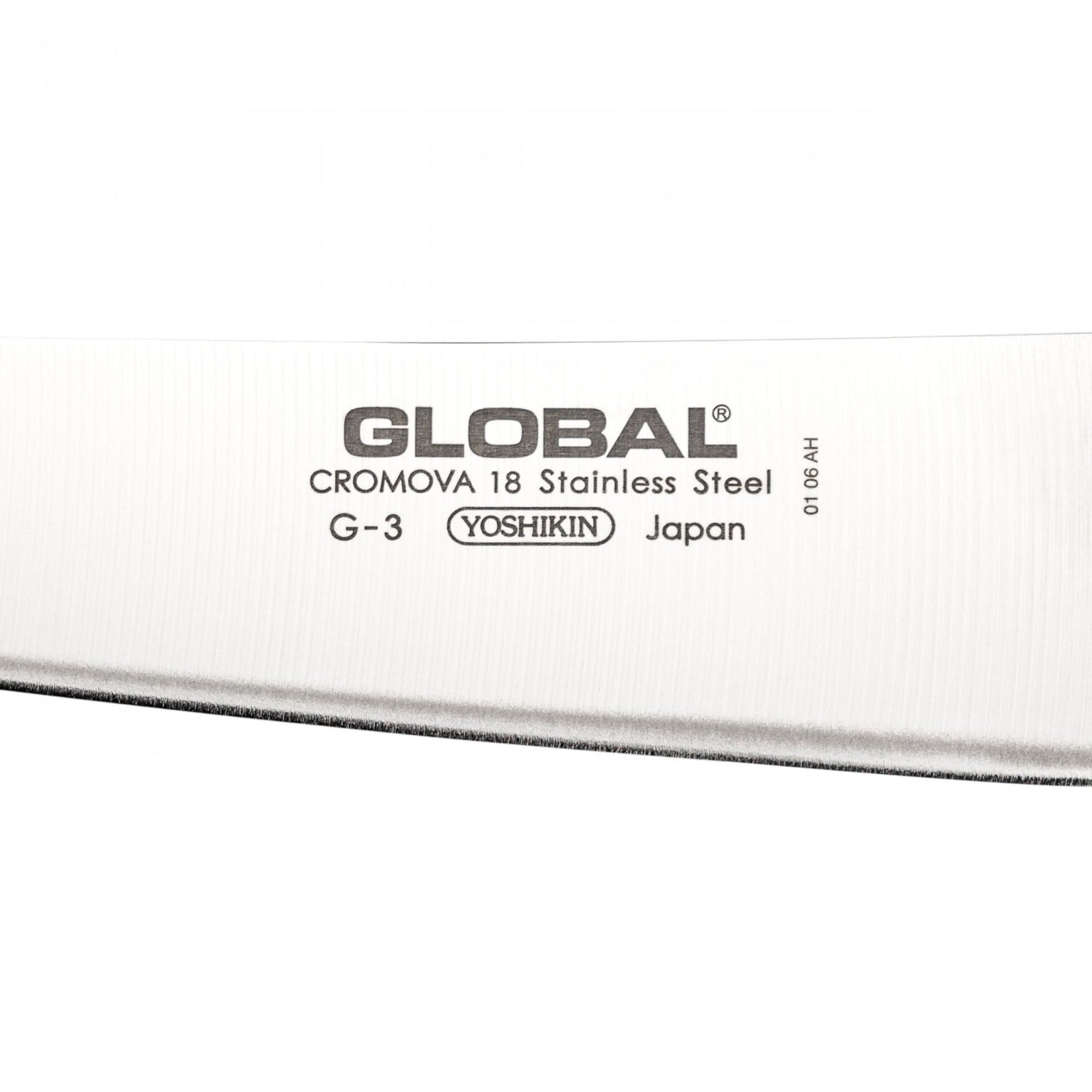 Close-up of a Global G-3 knife blade with branding and specifications.