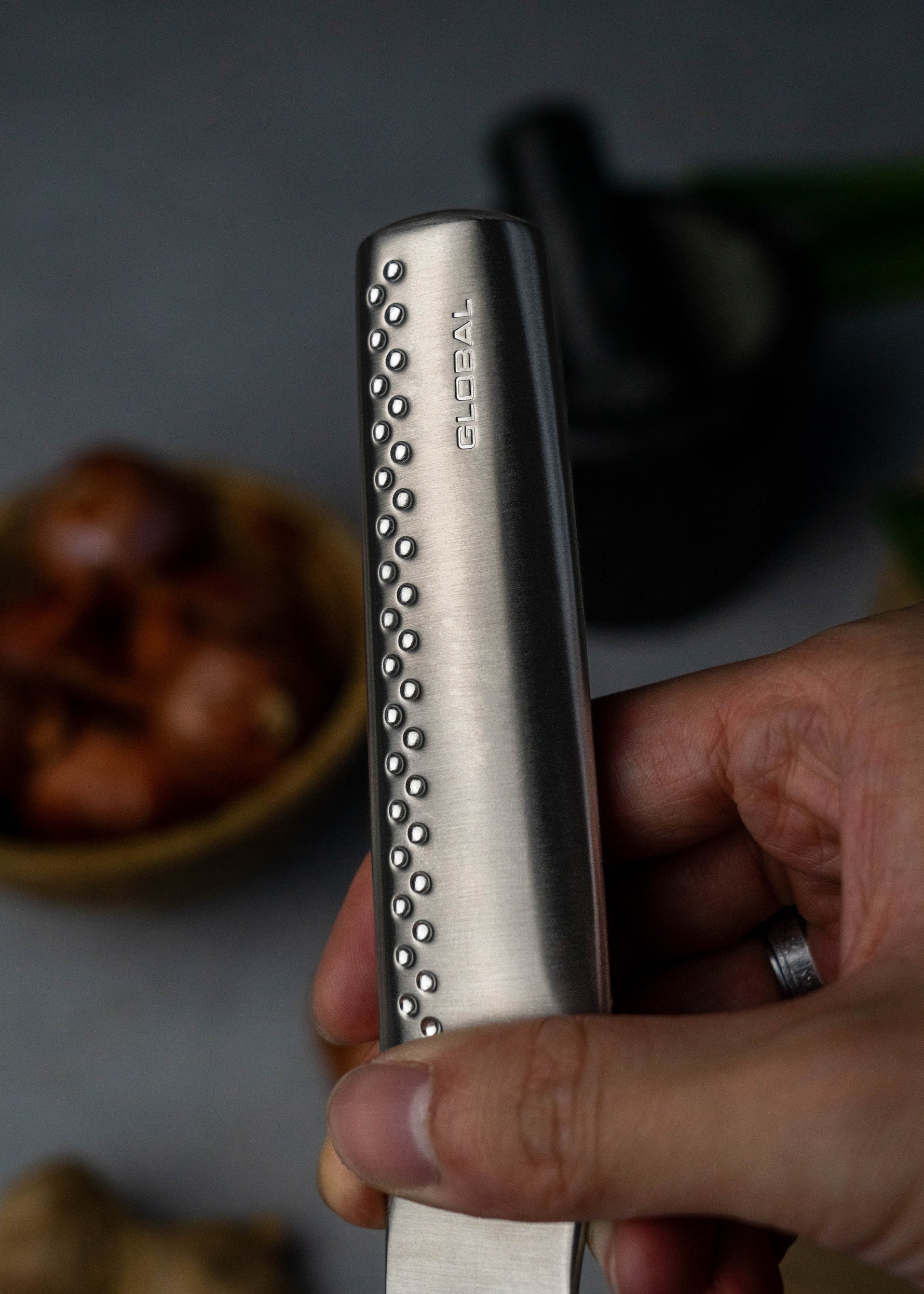 Global Ni Handle. Slightly longer handle then classic Global knives and a spine that has been marginally rounded to provide control and comfort using a pinch grip.